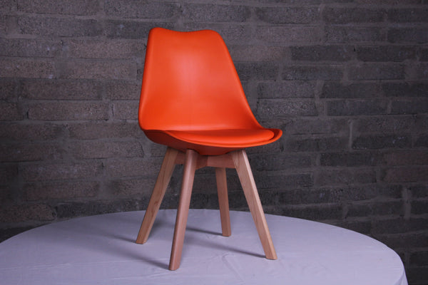 Eames Style Dining Chairs Orange with padded seat Back in stock